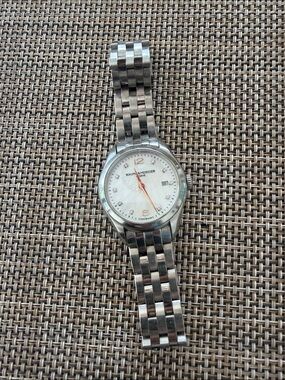 Baume & Mercier Women’s Silver Steel Bracelet Watch with White Dial 28 case size